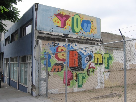 Painted on a building wall: You are important.