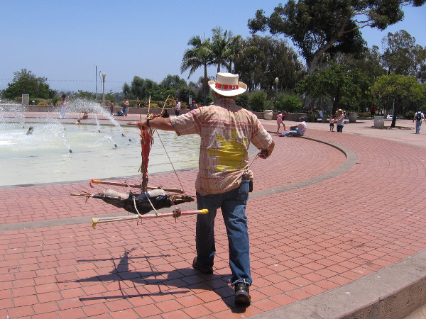 Taking a floating creation out to the big Balboa Park fountain.