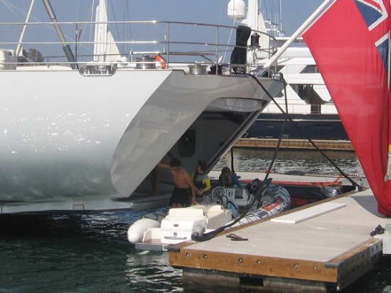 People enjoying a day on San Diego Bay return to sailing super-yacht M5.