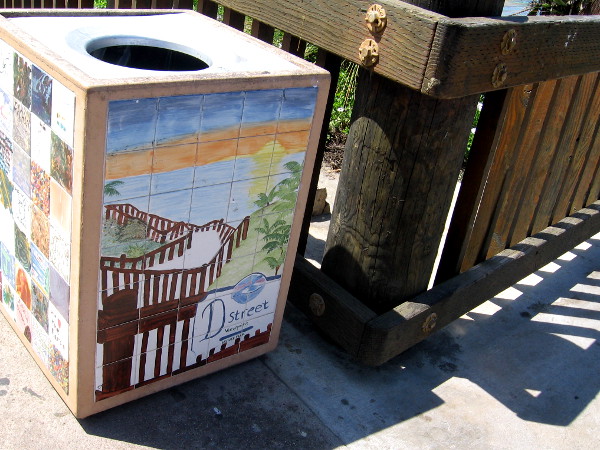 Tile art on trash can depicts the D Street Viewpoint.