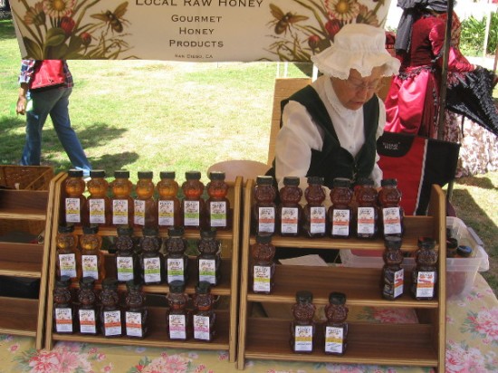 This nice lady in a bonnet was selling honey produced in San Diego.
