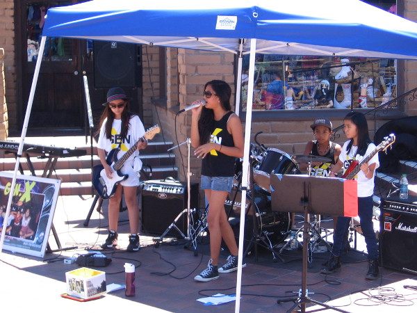 These talented kids playing classic rock tunes in Seaport Village form the band Gen-X!