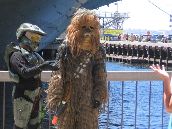 Chewbacca is hanging out with a Star Wars buddy near the USS Midway Museum.