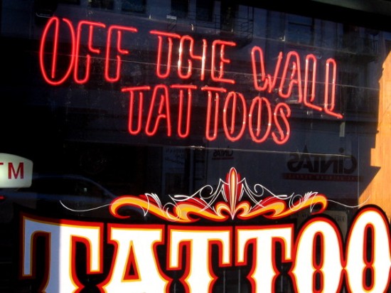Off the Wall Tattoos has an in the window neon sign.
