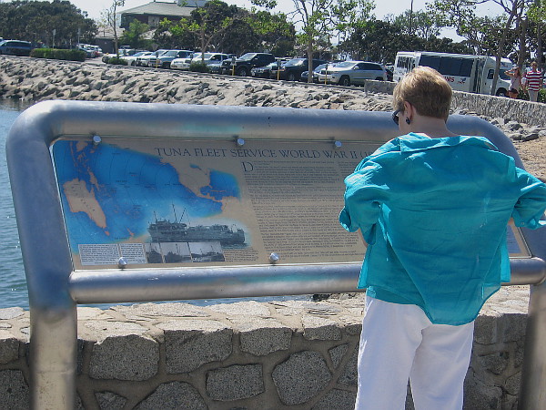 Someone walking down the Embarcadero near Tuna Harbor pauses to read a bit of fascinating information concerning the Second World War.