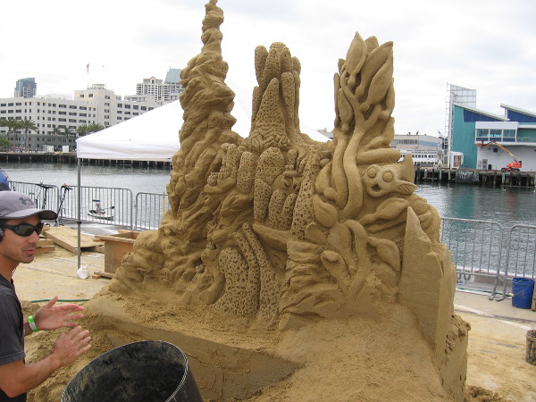 This sand sculpture seems to recreate a coral reef. I don't know its title. I do know Team San Diego San Castles created it!