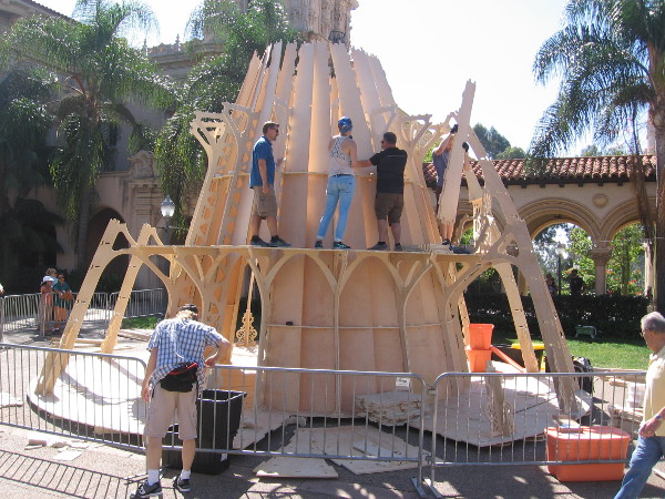 These creators at Maker Faire San Diego were building the Temple for Youtopia. It's an interlocking plywood parabaloid with a single light source at it's focal point.