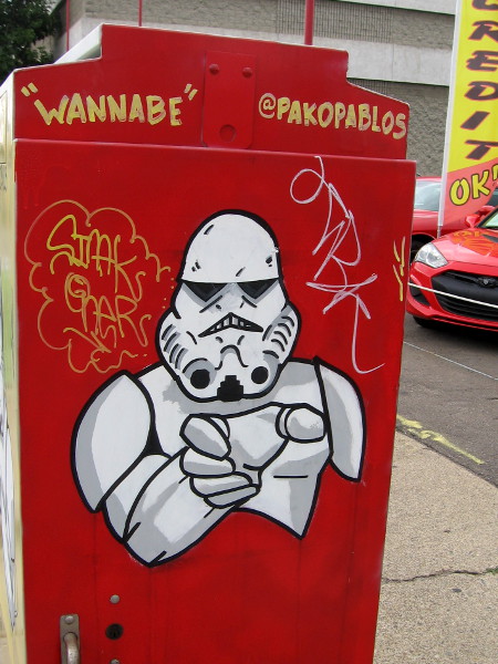Wannabe Stormtrooper on a second utility box seems to idolize Darth Vader and his mastery of the Dark Force.