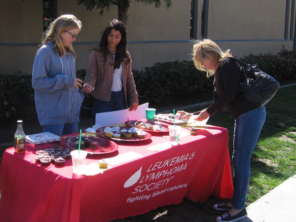 Generous young ladies have a bake sale in Point Loma to collect donations for the Leukemia and Lymphoma Society.