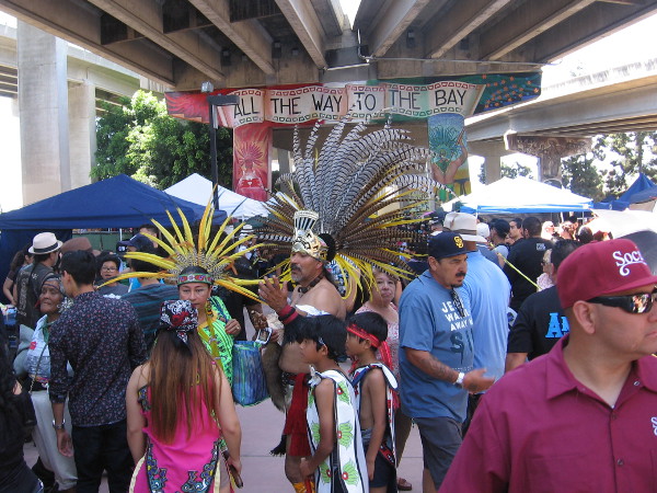 Many dancers who would perform at the Chicano Park Day Celebration wore resplendent Aztec costumes.