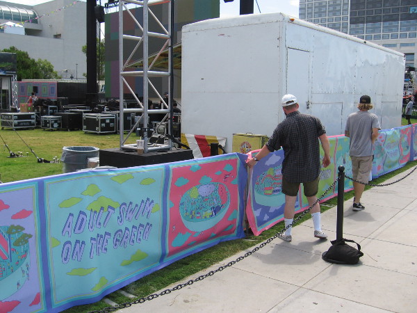 Some final adjustments to banners enclosing the Adult Swim on the Green.