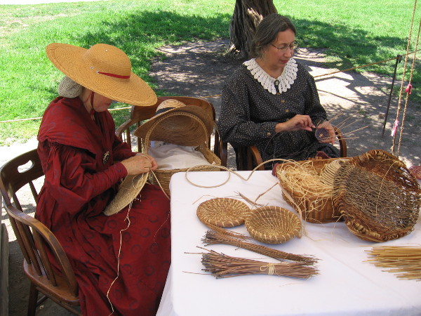 These ladies were weaving baskets. Basket-weaving is said to be the oldest of all human crafts.