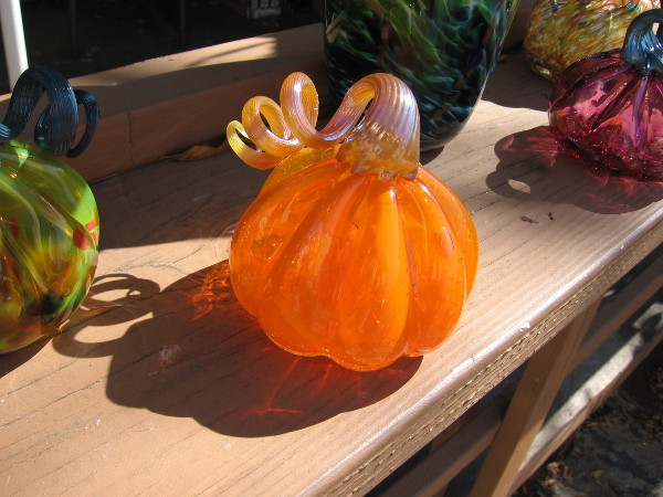 A beautiful glass pumpkin, that was made by the glassblowers of Spanish Village.