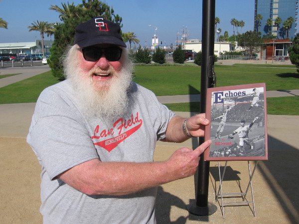 Local baseball expert Bill Swank shows his book Echoes from Lane Field, which recounts the early years of San Diego baseball and the Padres.