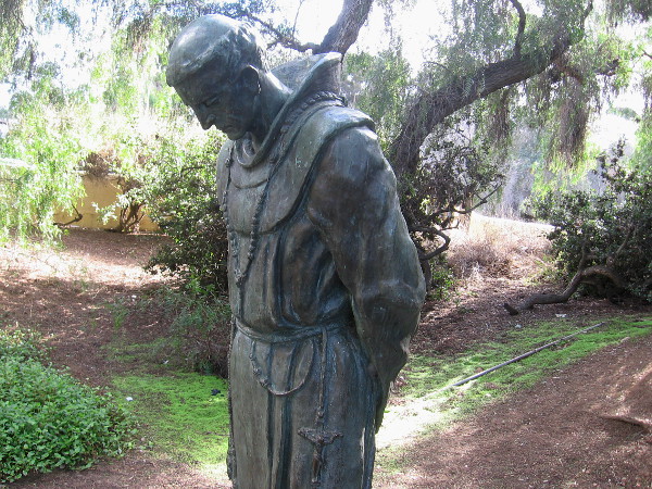 The Padre, by Arthur Putnam, 1908. The public artwork stands on a patch of grass among trees on Presidio Hill.