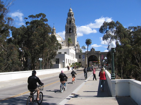 Riding bicycles one sunny Sunday over the Cabrillo Bridge into the heart of Balboa Park.