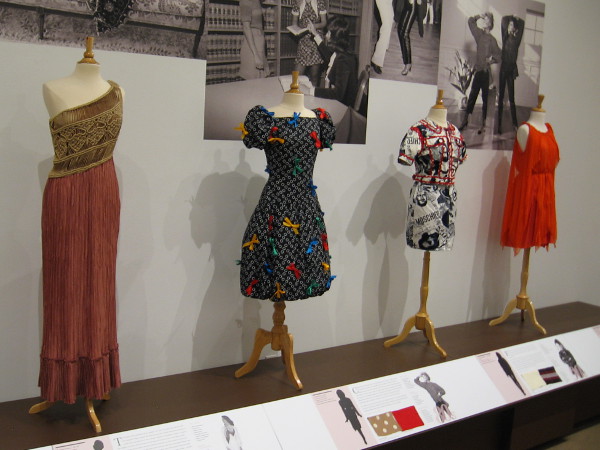 Dresses from the past nine decades are like a timeline representing evolving culture and various impacts of technology.