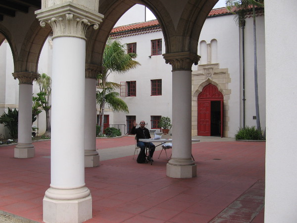 A gentleman in the church's courtyard greeted visitors for the weekend architectural event.