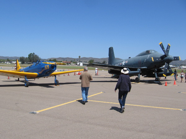 Visitors to Air Group One's first ever Warbird Expo and Militaria Swap Meet check out more vintage airplanes at Gillespie Field.