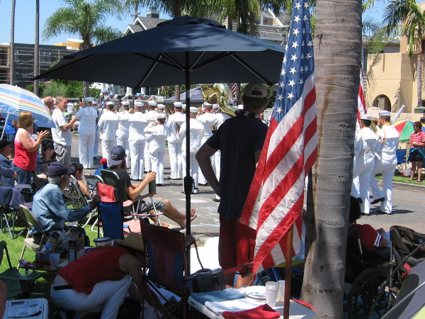 Members of the United States Navy march past.
