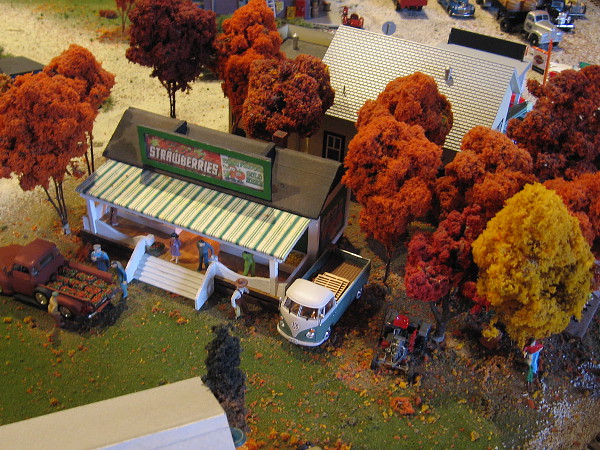 Colorful autumn leaves fill tiny trees at the Old Town Model Railroad Depot!
