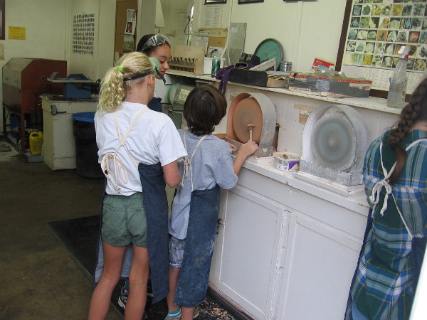 Artistic kids were using lapidary equipment inside the San Diego Mineral and Gem Society Museum.