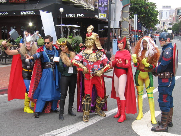 A big lineup of cosplay superheroes in the Gaslamp Quarter during 2019 San Diego Comic-Con!