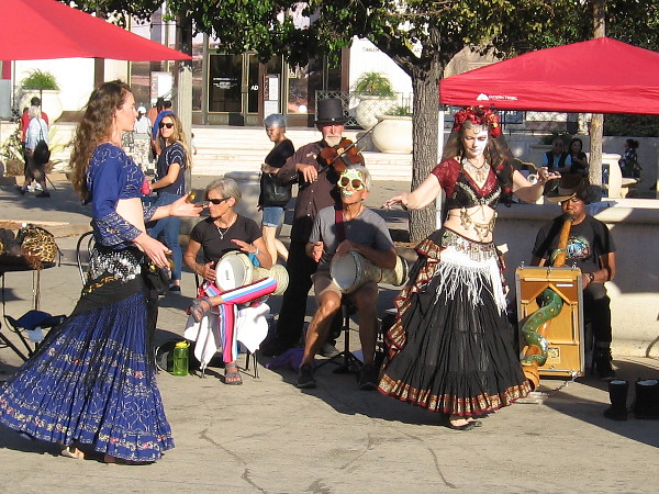 A violin, drums, didgeridoo and belly dancers fill the Plaza de Panama with life.